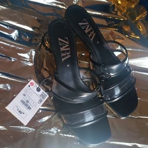 Clear/black heels